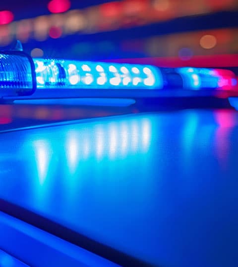 Close up of an emergency vehicle’s roof, focusing on its first responder beacon