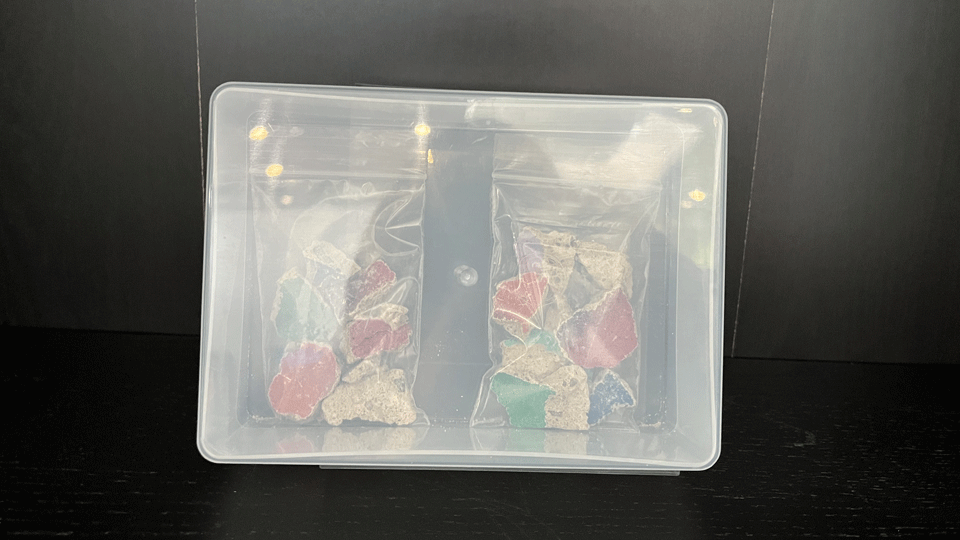 pieces of the berline wall in a box