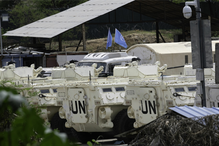 group of armored military cars from the UN parked at a camp in South Sudan