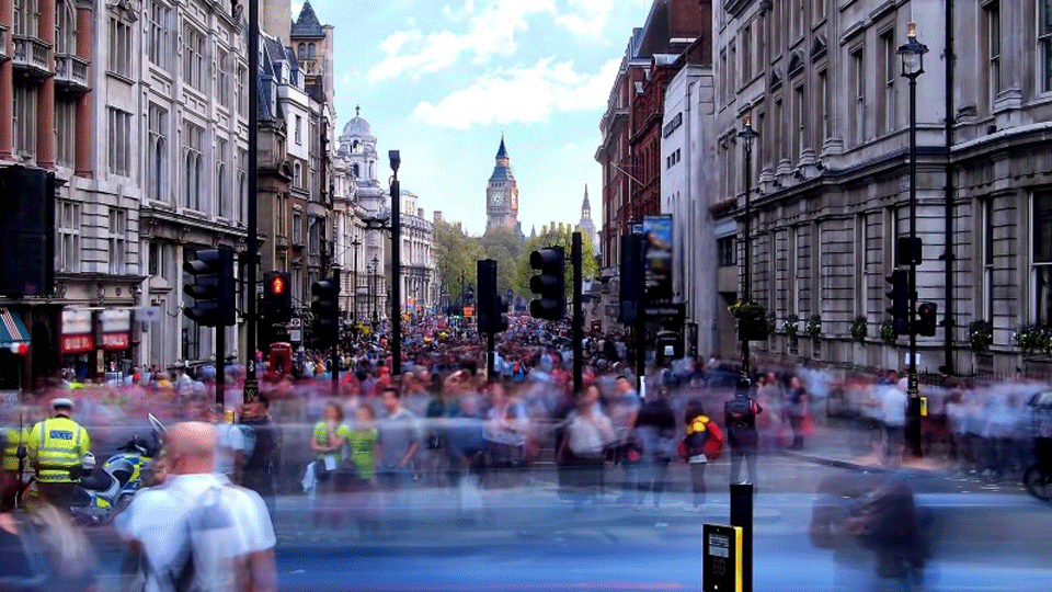 A busy street in London with Big Ben in the background