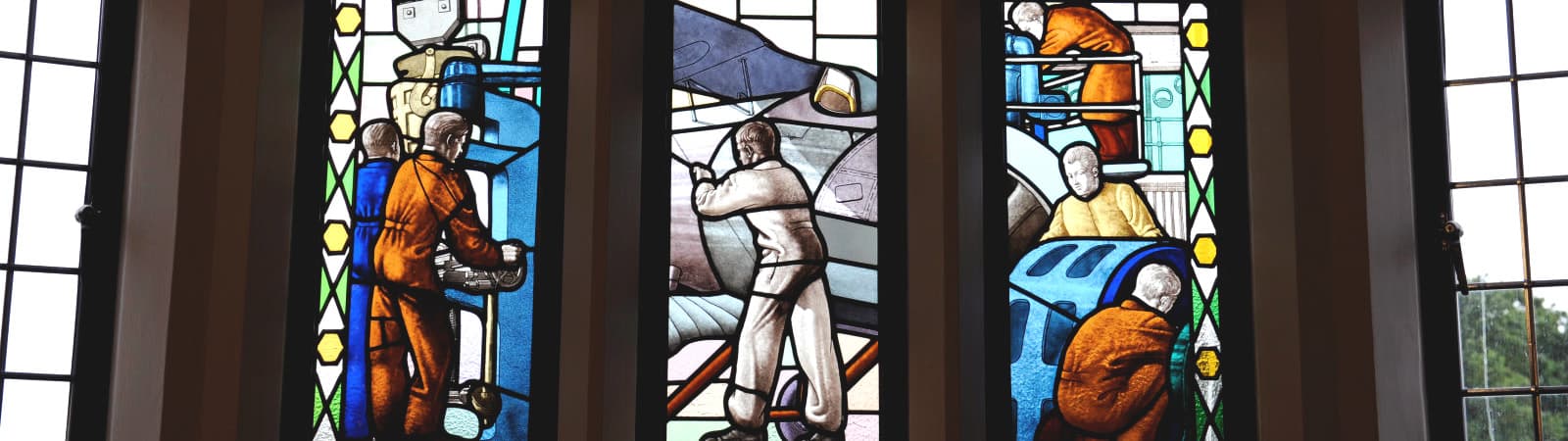 Stained glass in Hazlerigg showing our heritage as a technical college.