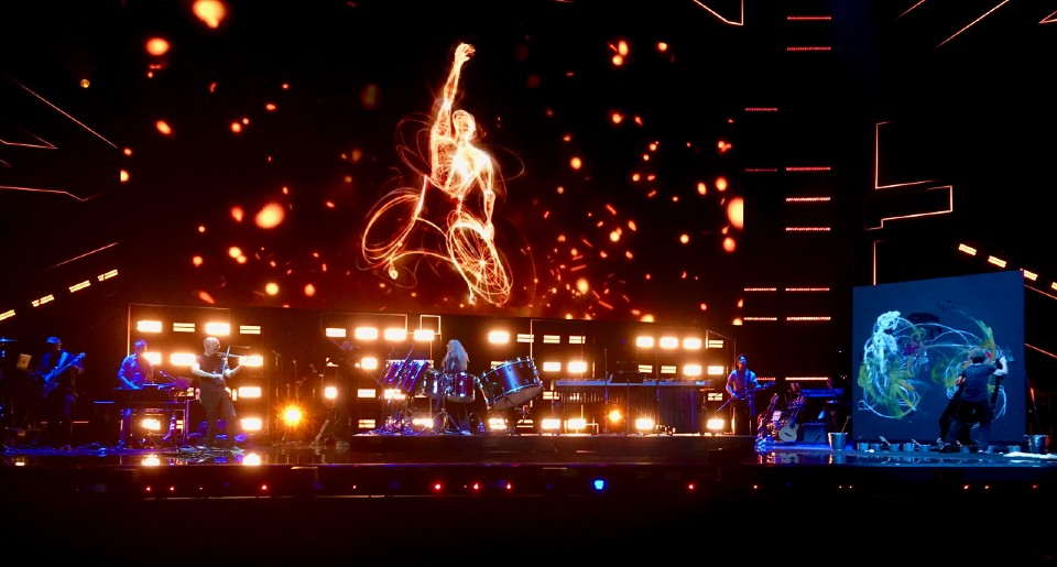 Rachel Gadsden painting at the paralympics homecoming event