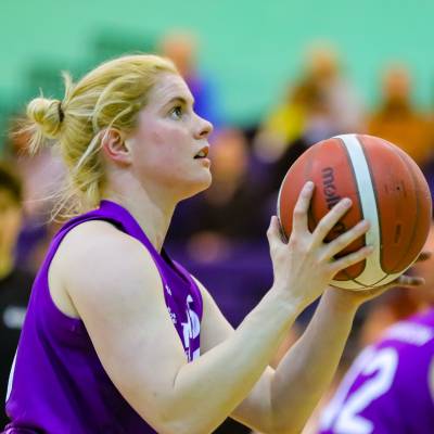 Robyn Love playing wheelchair basketball