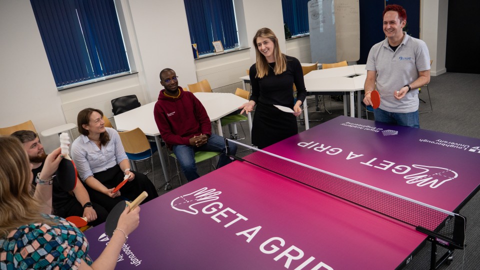 Ergonomics and Human Factors experts discussing different table tennis bats