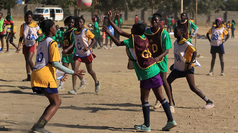 Young children playing netball in Zambia.