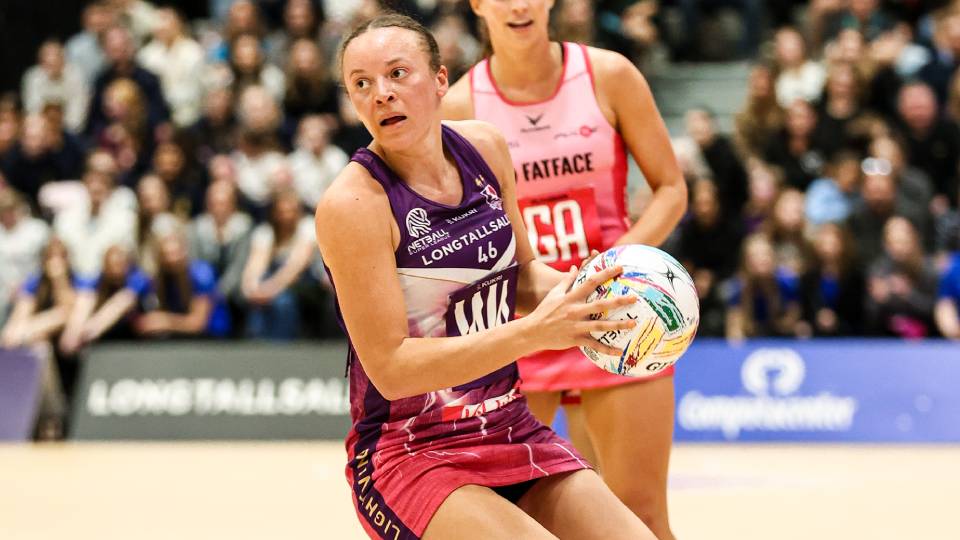lightning netball player hannah joseph with the ball