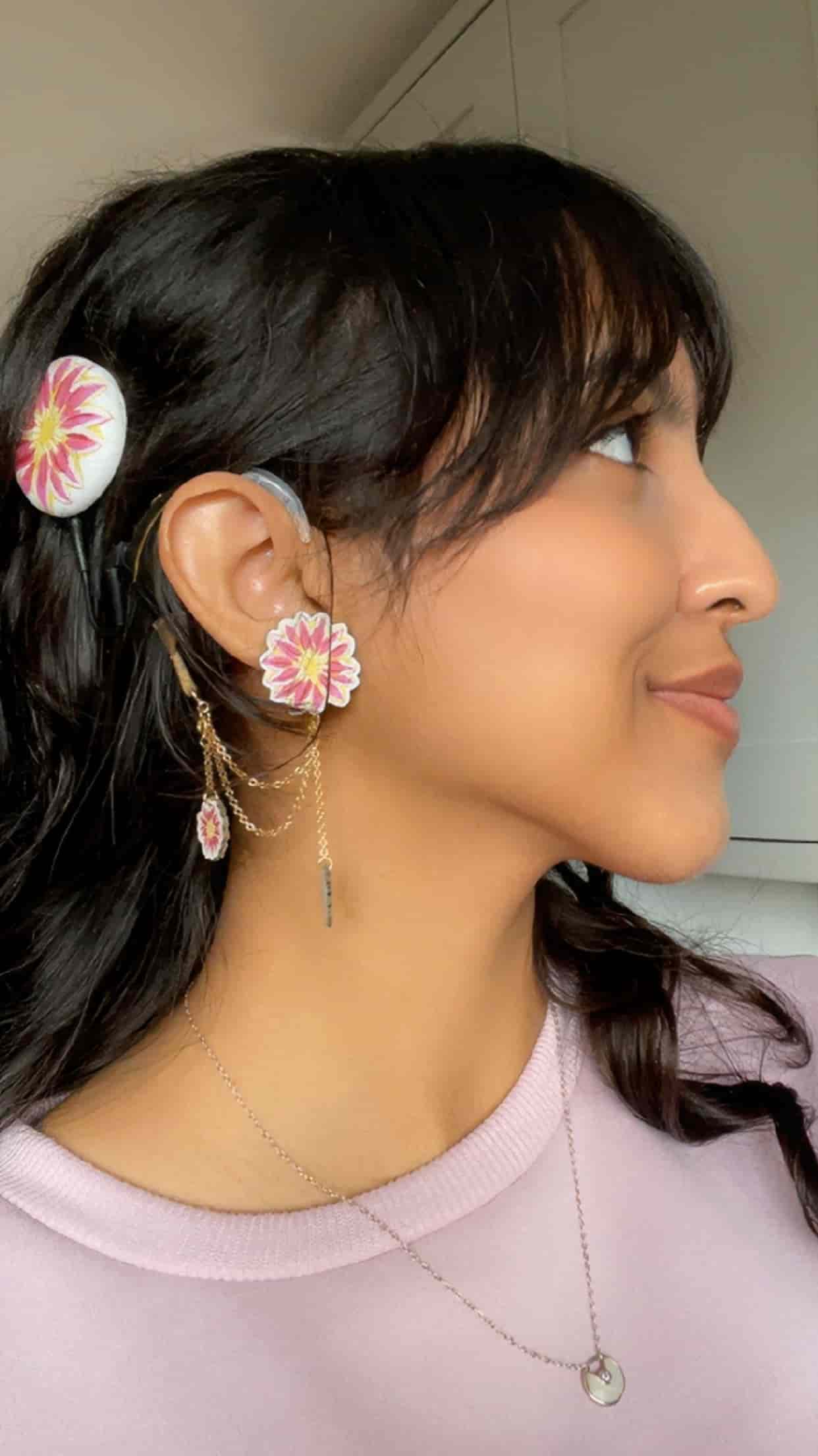 Close-up of Gargi Agrawalla wearing her hearing technology jewellery.
