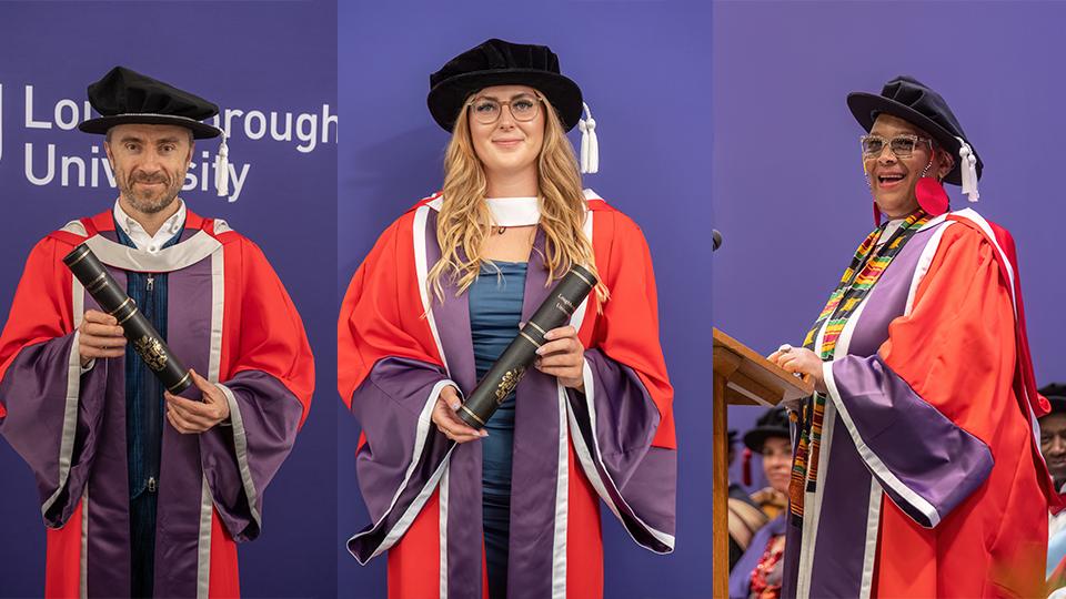 Three honorary graduates wearing red and purple graduation gowns and black caps holding scrolls