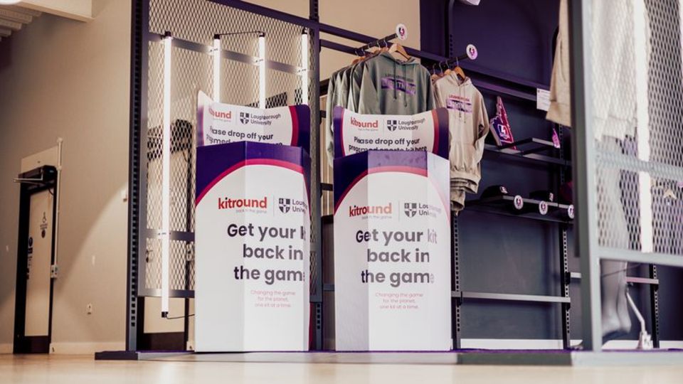 Two kitround bins alongside Loughborough Lightning merch at Loughborough campus.