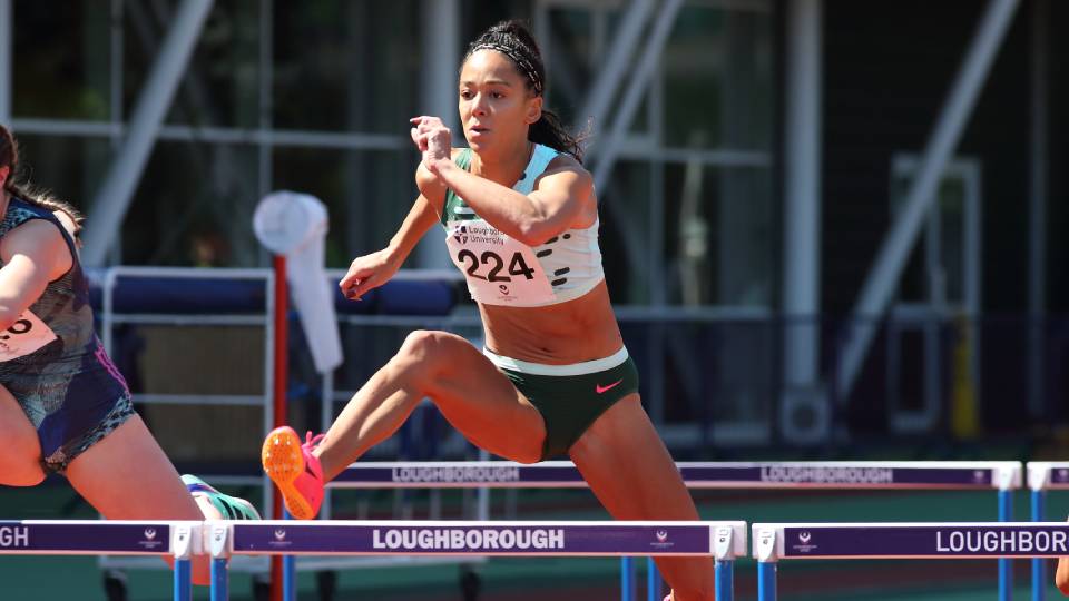 Katarina Johnson-Thompson jumping over a hurdle