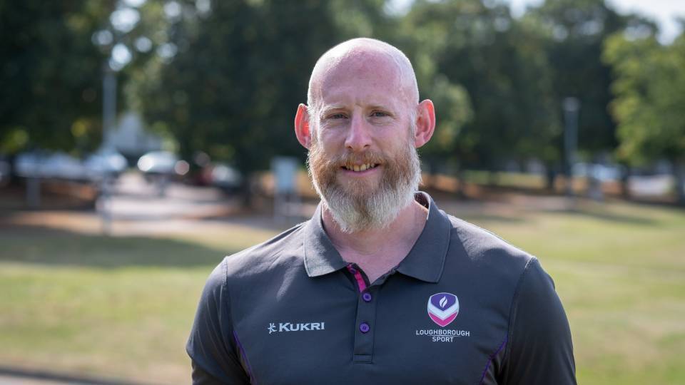 a head shot of swimming coach andi manley