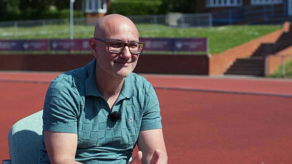 dr anthony papathomas sitting down