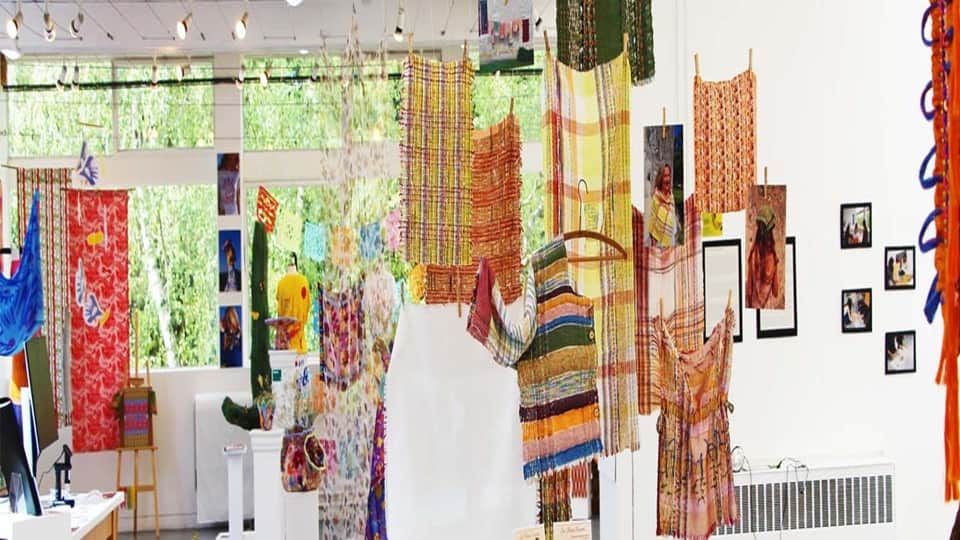 Colourful textiles hanging at the 2025 Degree Show.