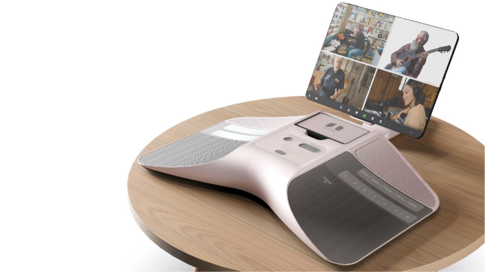 A digital musical instrument with a screen showing four people playing music.