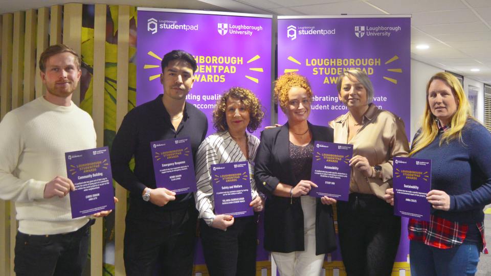 Six people standing together holding certificates at the Loughborough Studentpad Awards evening.