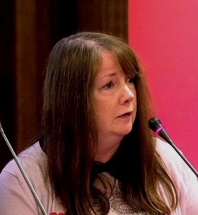 Professor Caroline Kennedy-Pipe speaking at a conference.