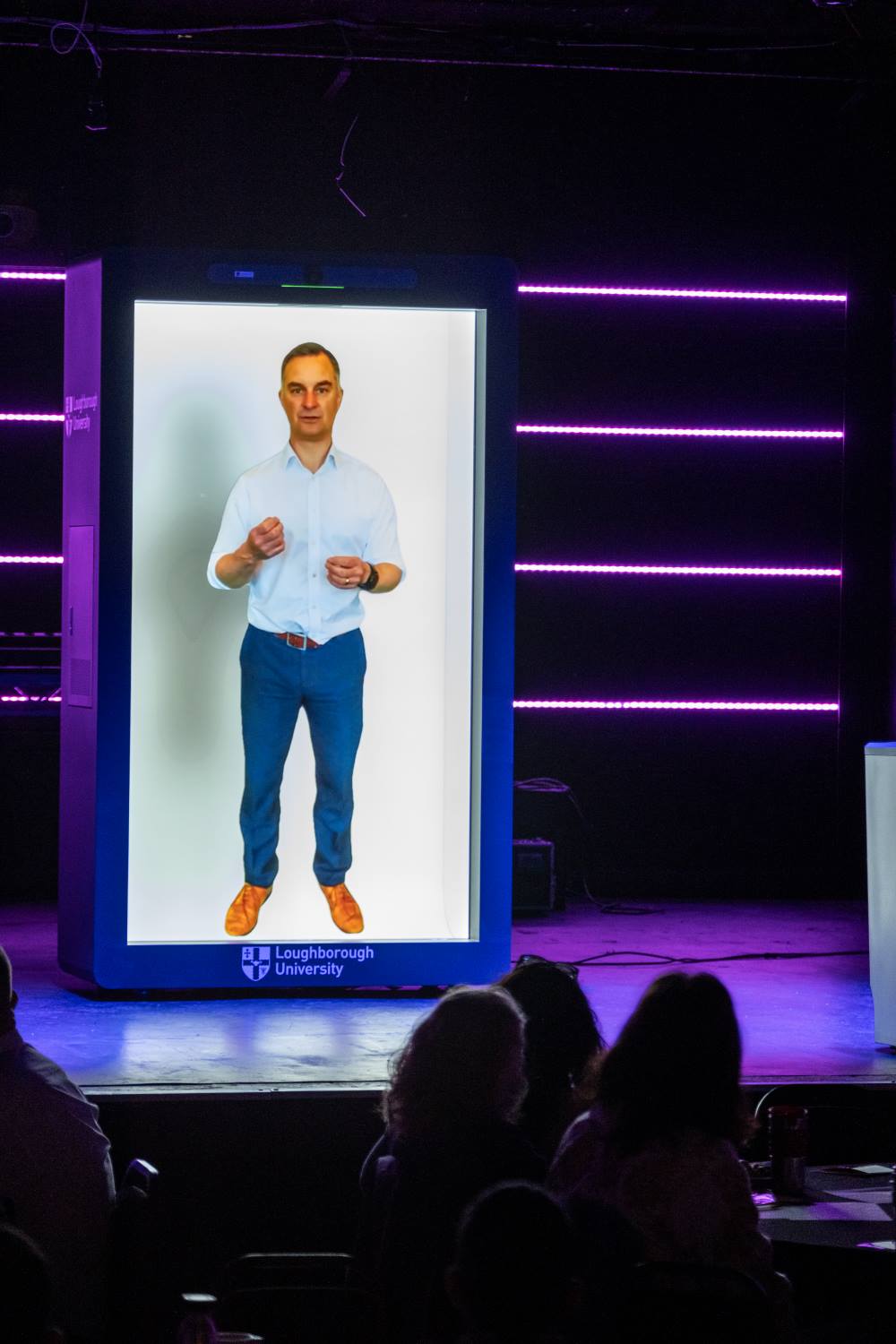 A virtual 'AI' Sam displayed on hologram technology on the stage