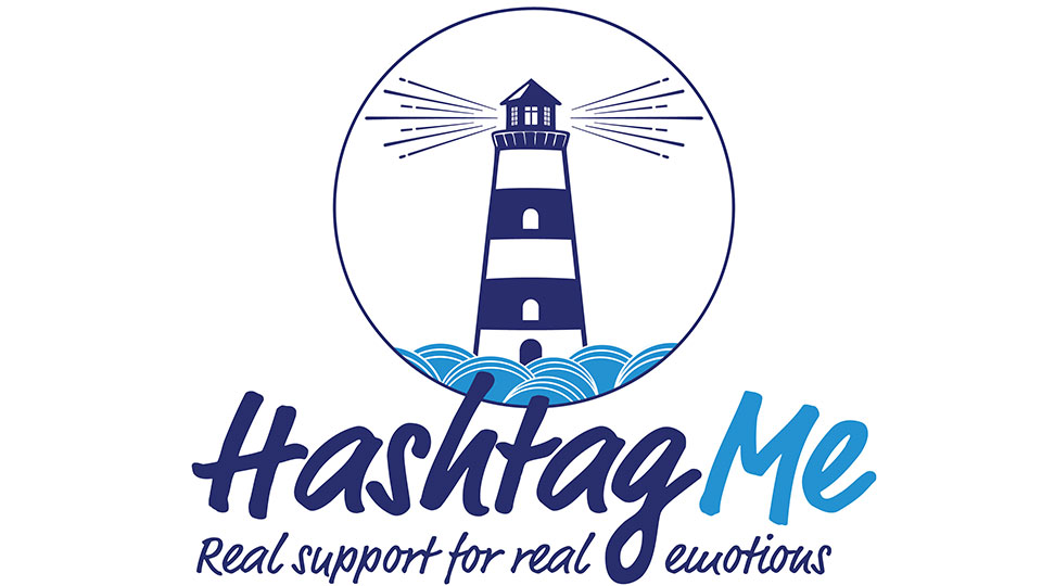 Hashtag Me logo of a navy and white lighthouse on the sea with 'Hashtag Me' and 'Real support for real emotions' written underneath.