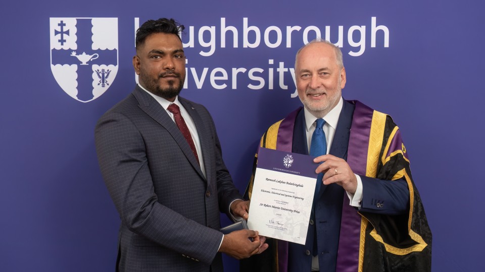 Rameesh Bulathsinghala being awarded the Sir Robert Martin Prize by VC Nick Jennings.
